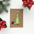 Wilhelmiina Design Mustankissan joulukortit Kuusi marrón